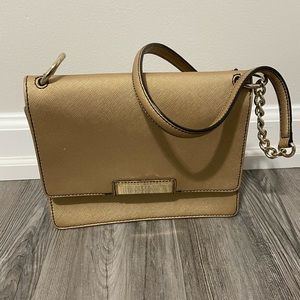 Calvin Klein cross-body bag. Rusty gold color.